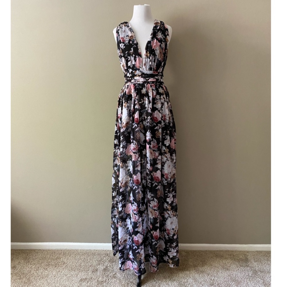 Absolutely a must have maxi criss cross back dress